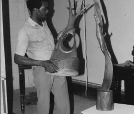 man assembling the art work