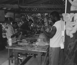 artist doing the carving